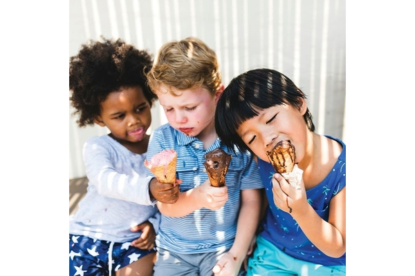 Image Three boys eating ice cream.